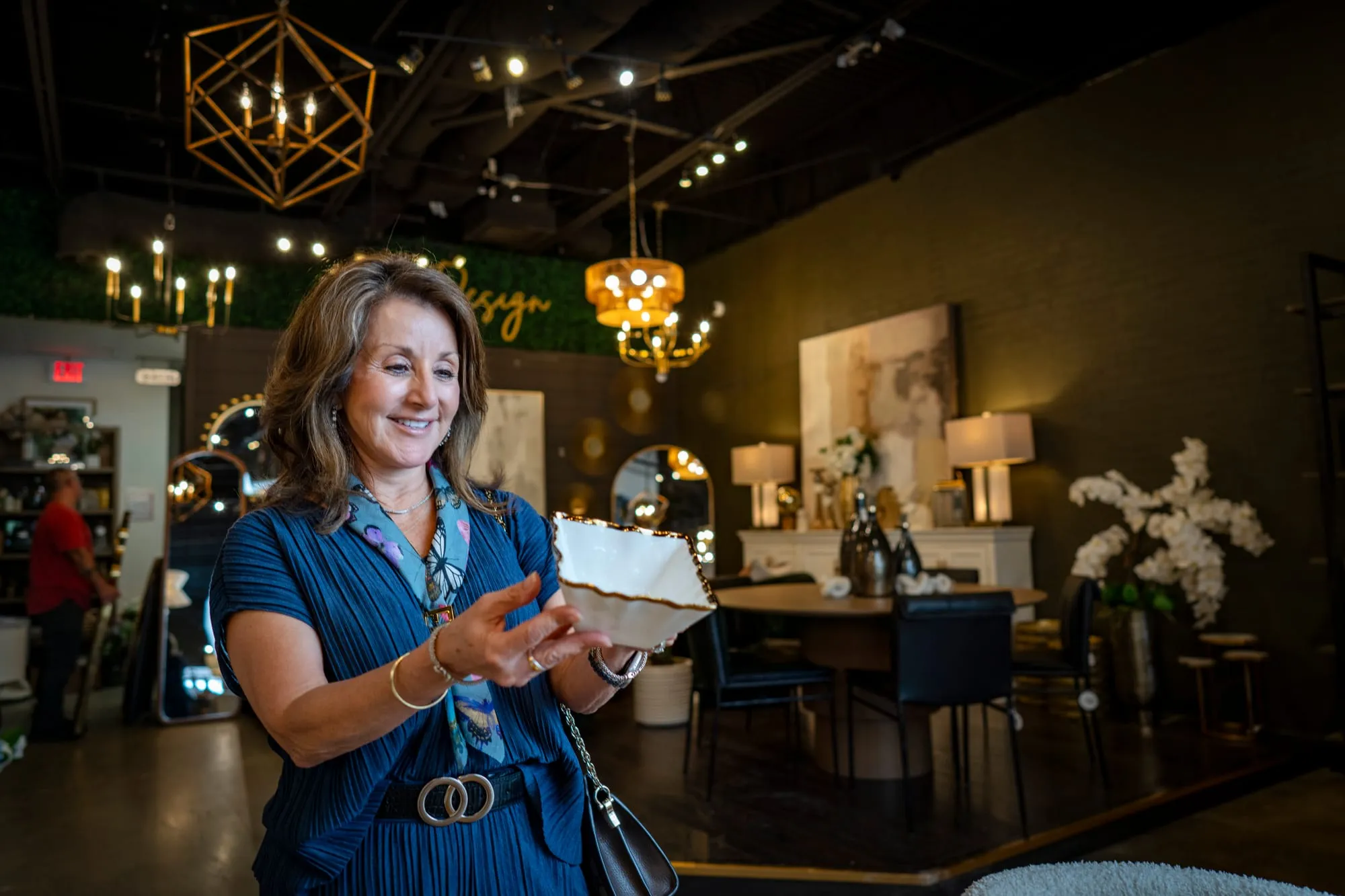 A shopper in a locally owned home decor store in Rockwall. Quality of life, photographed where it happens.