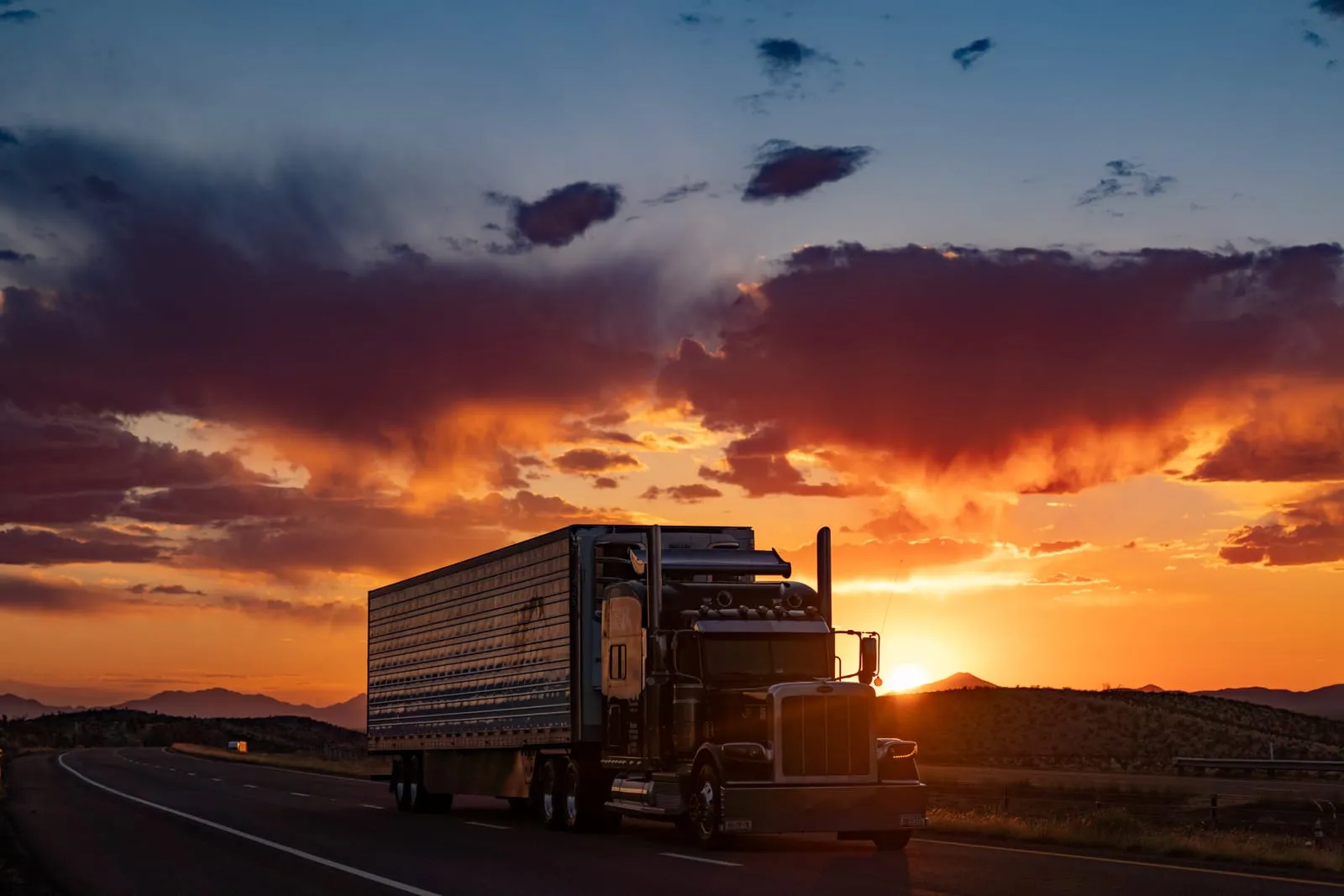 Long-Nose Semi Passing at Sunset, West Texas