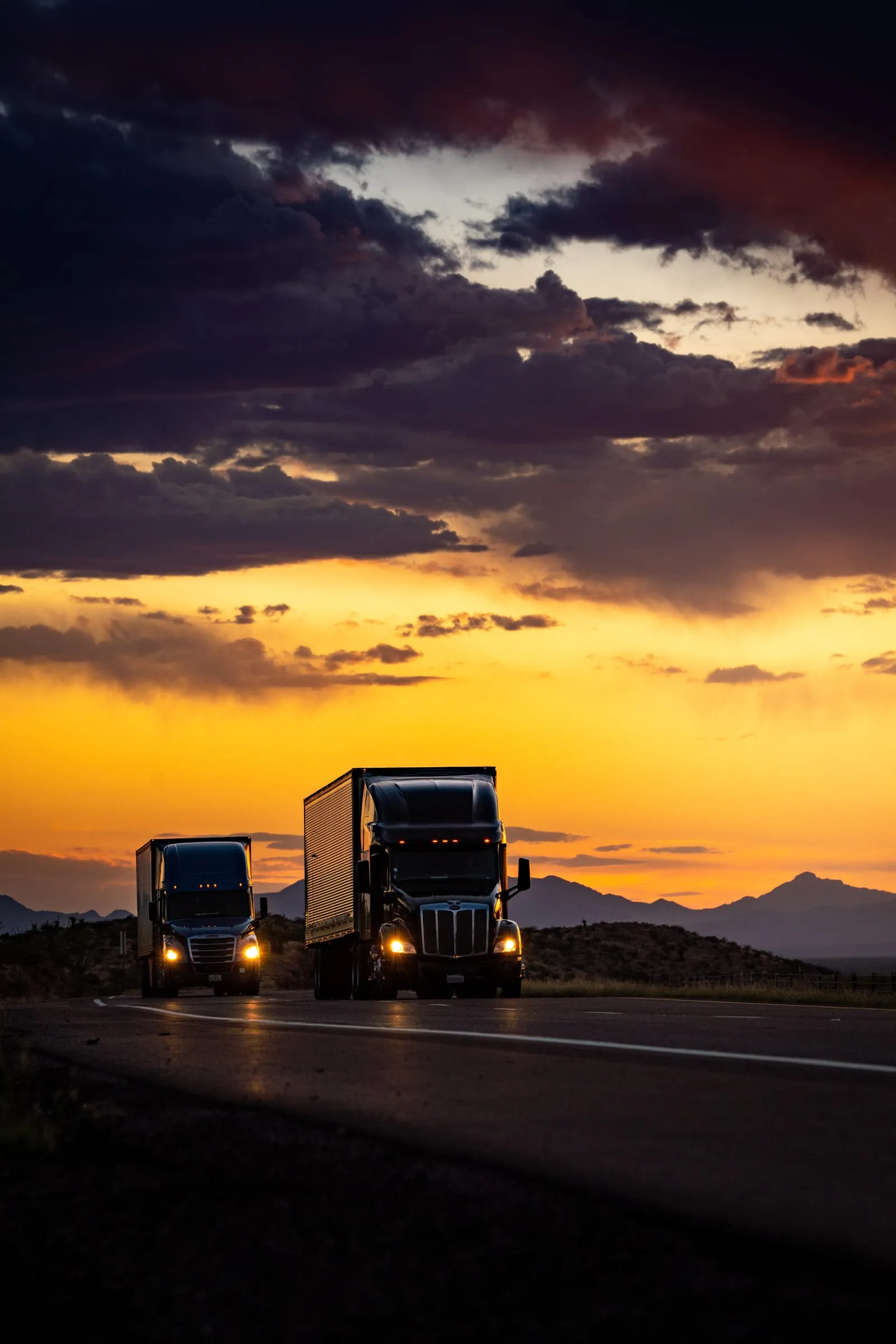 Two Semis With Headlights at Dusk, West Texas