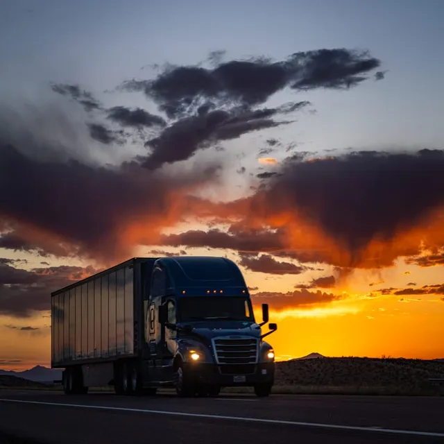 Semi Truck Silhouette Under a Dusk Sky, West Texas